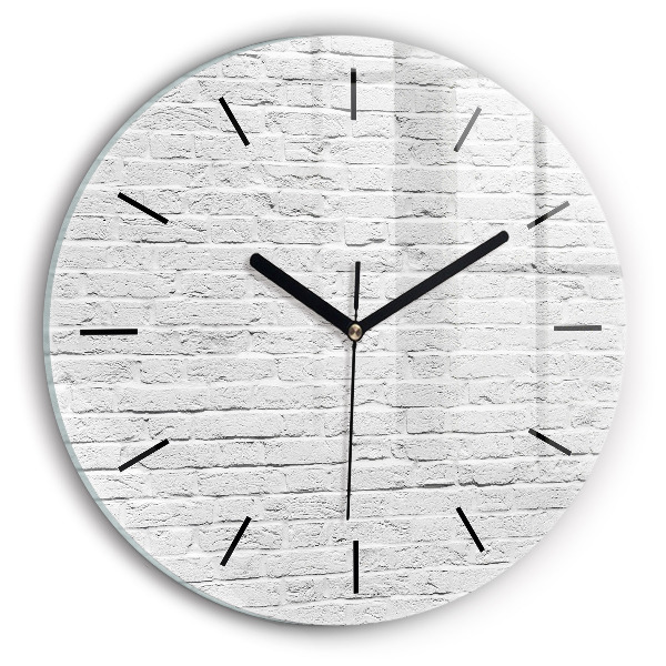 Round glass clock A wall of light bricks