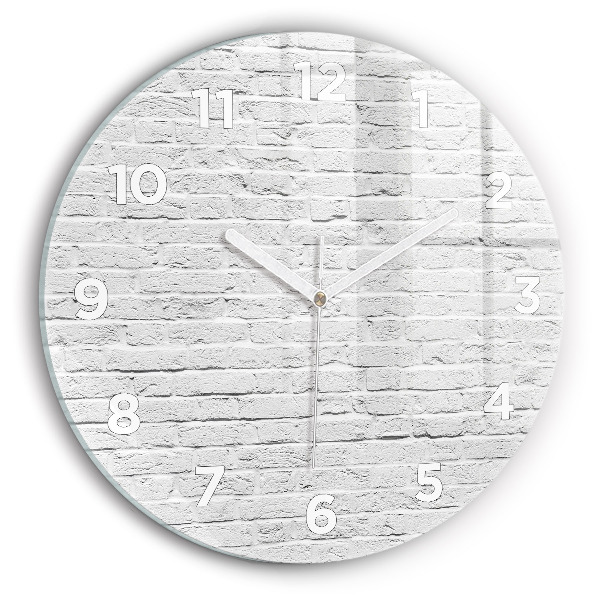 Round glass clock A wall of light bricks