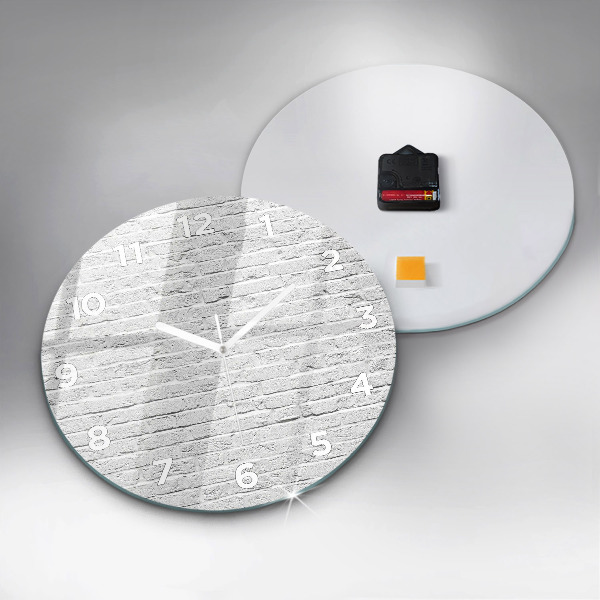 Round glass clock A wall of light bricks