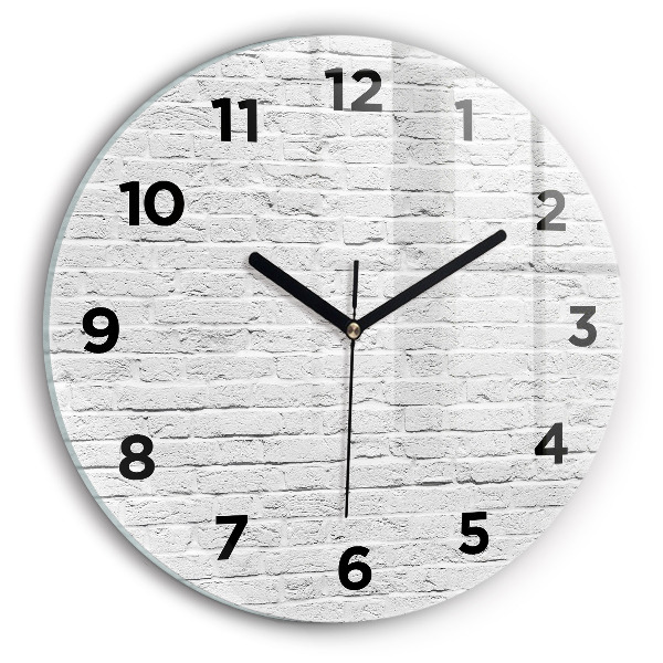 Round glass clock A wall of light bricks