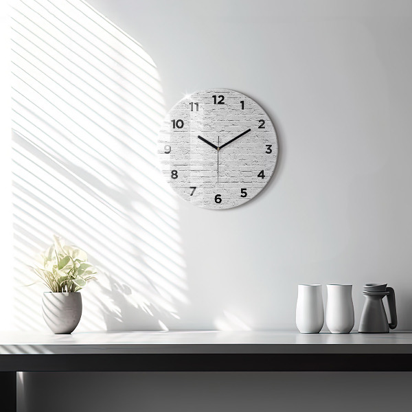 Round glass clock A wall of light bricks