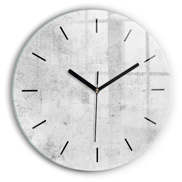 Round glass clock Concrete wall