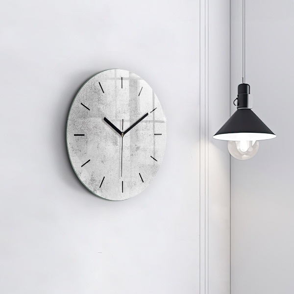 Round glass clock Concrete wall