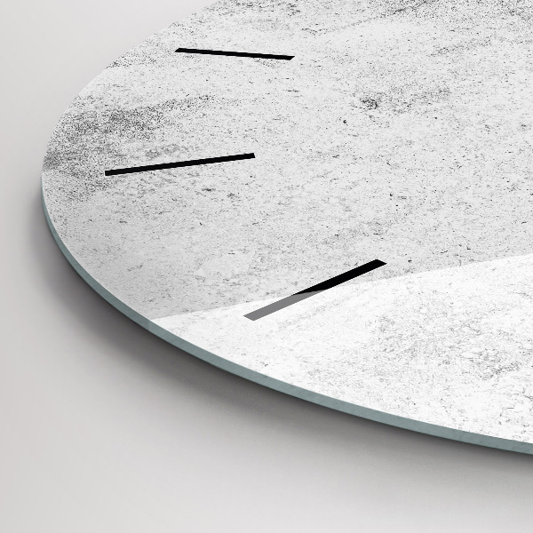 Round glass clock Concrete wall