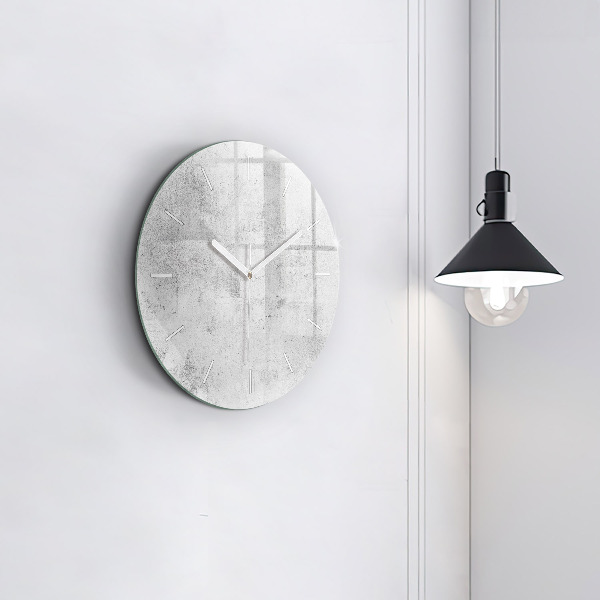 Round glass clock Concrete wall