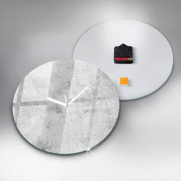 Round glass clock Concrete wall