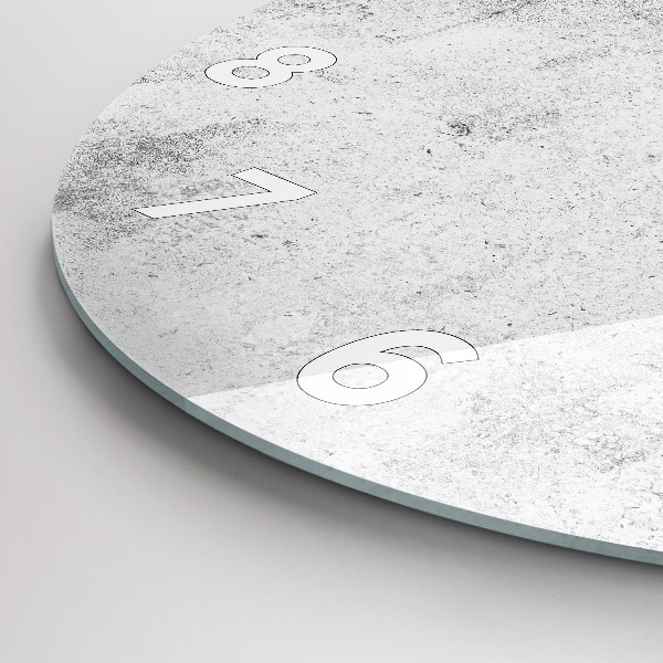 Round glass clock Concrete wall