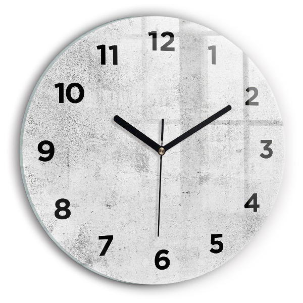 Round glass clock Concrete wall