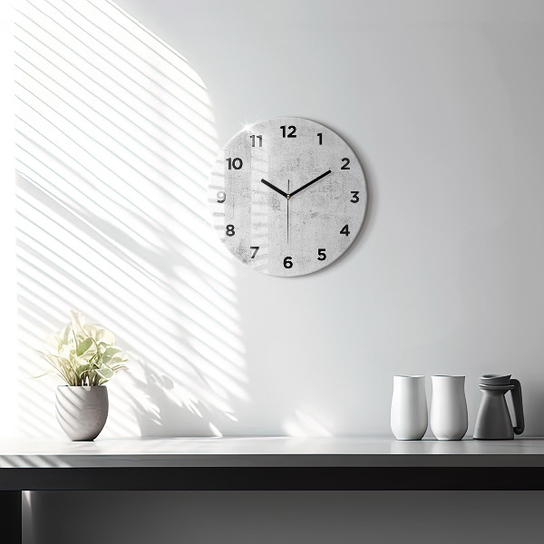 Round glass clock Concrete wall