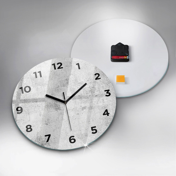 Round glass clock Concrete wall