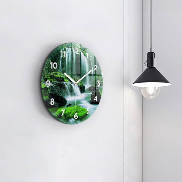 Round glass clock Waterfall among the moss
