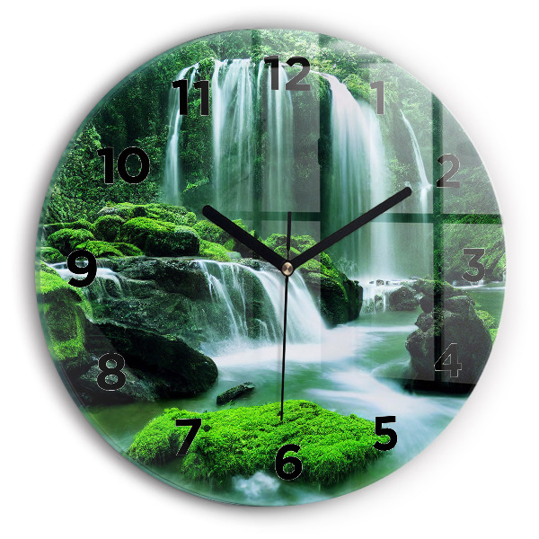 Round glass clock Waterfall among the moss