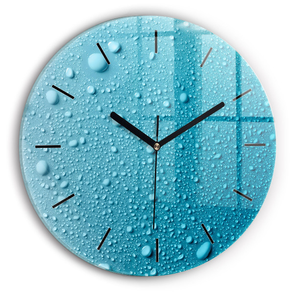 Round glass clock Water drops on glass