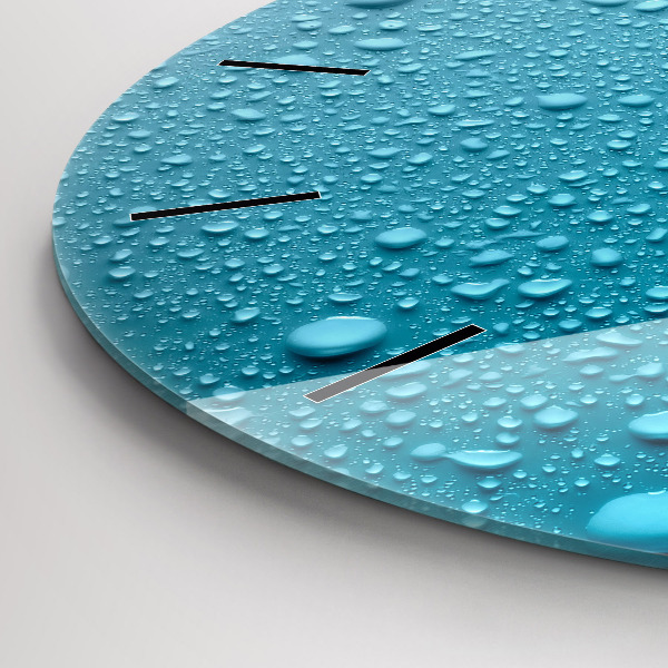 Round glass clock Water drops on glass