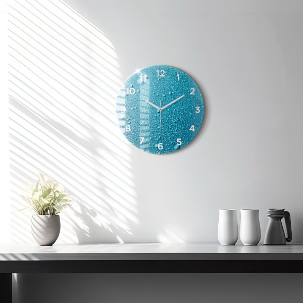 Round glass clock Water drops on glass
