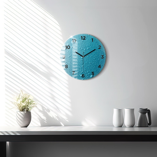 Round glass clock Water drops on glass