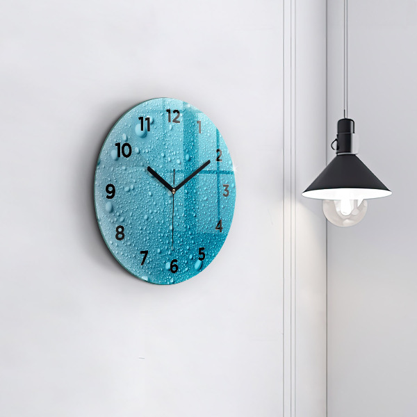 Round glass clock Water drops on glass