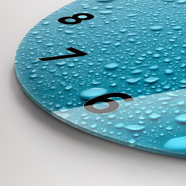 Round glass clock Water drops on glass