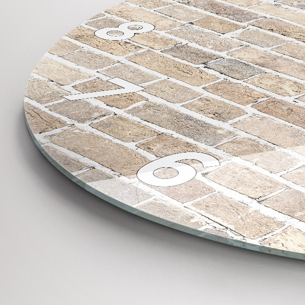 Round glass clock Brick wall