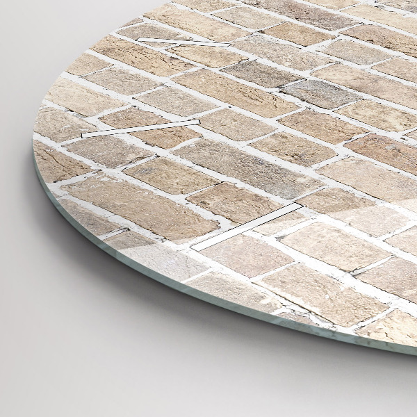 Round glass clock Brick wall