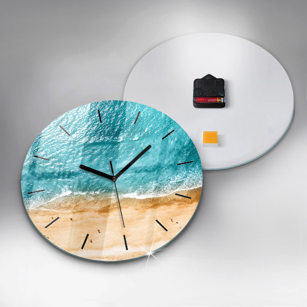Round glass clock sea beach people