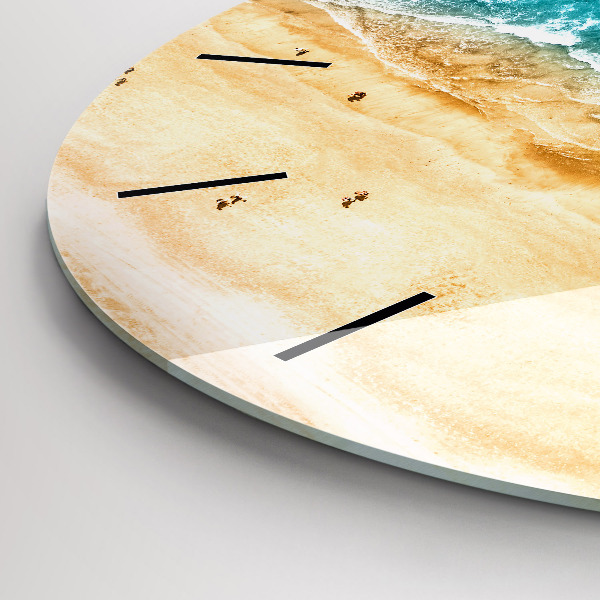 Round glass clock sea beach people