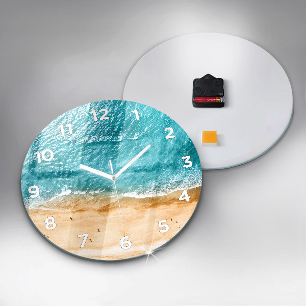 Round glass clock sea beach people