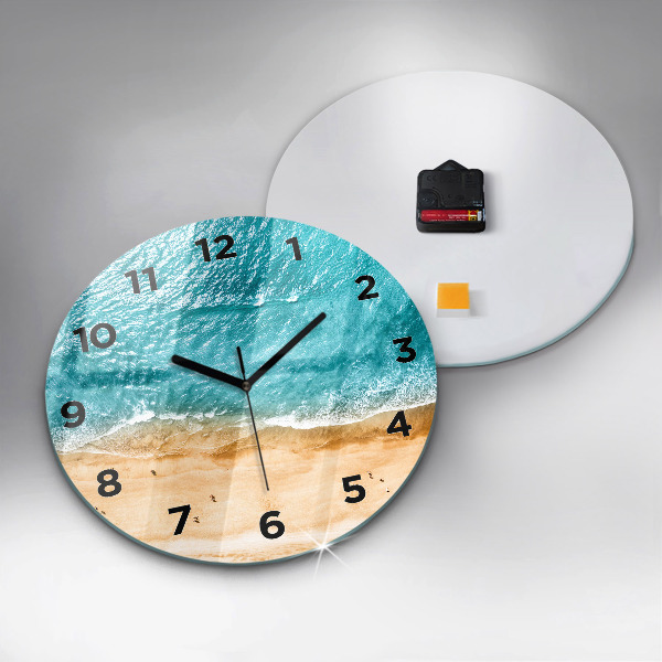Round glass clock sea beach people