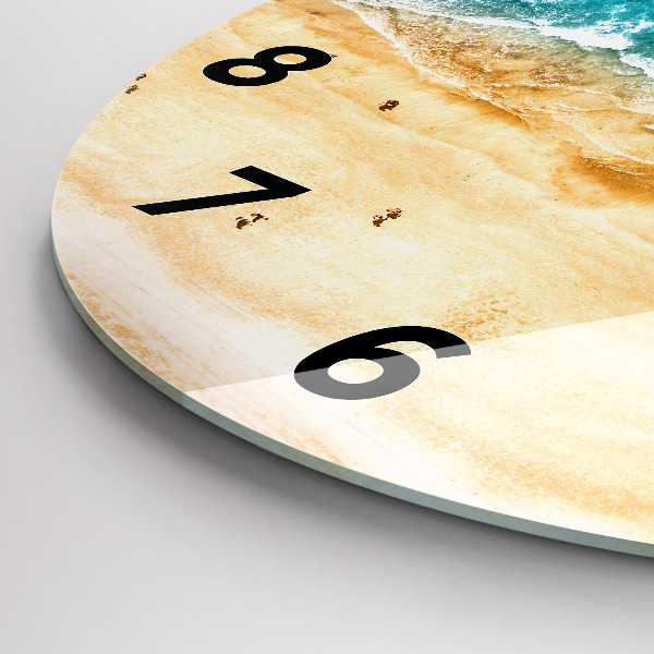 Round glass clock sea beach people