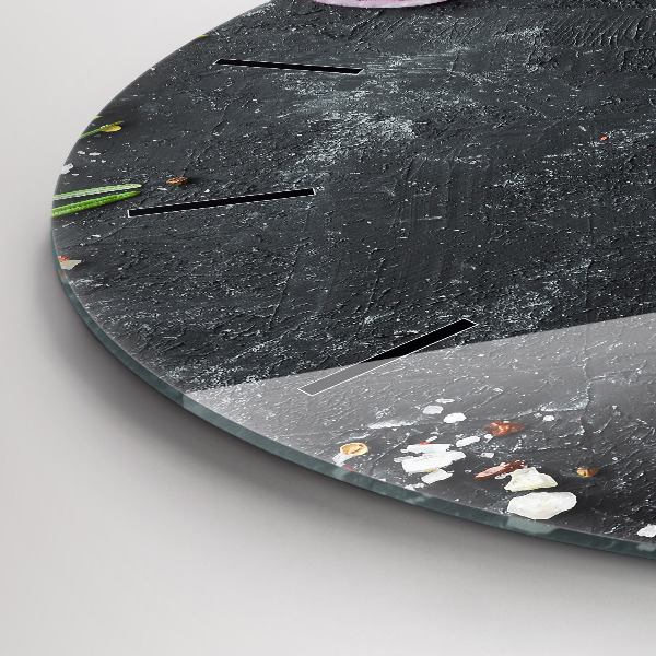 Round glass clock Vegetables on the table