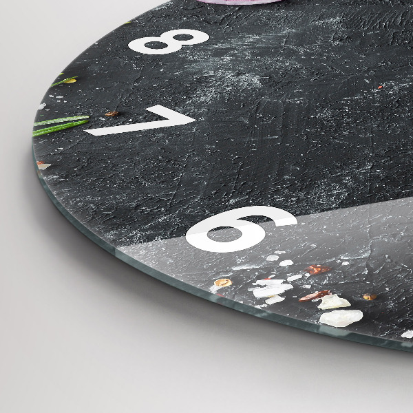 Round glass clock Vegetables on the table