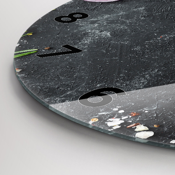 Round glass clock Vegetables on the table