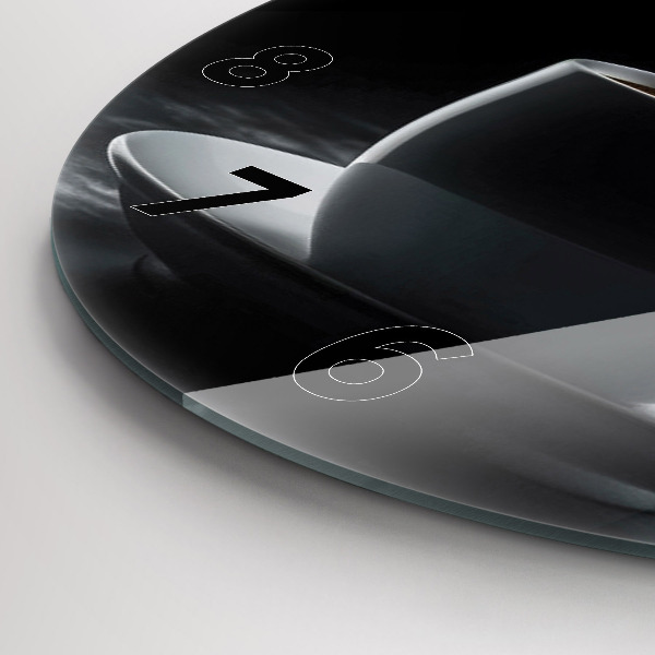 Round glass clock A cup of black coffee