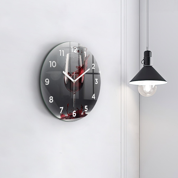 Round glass clock A glass of red wine