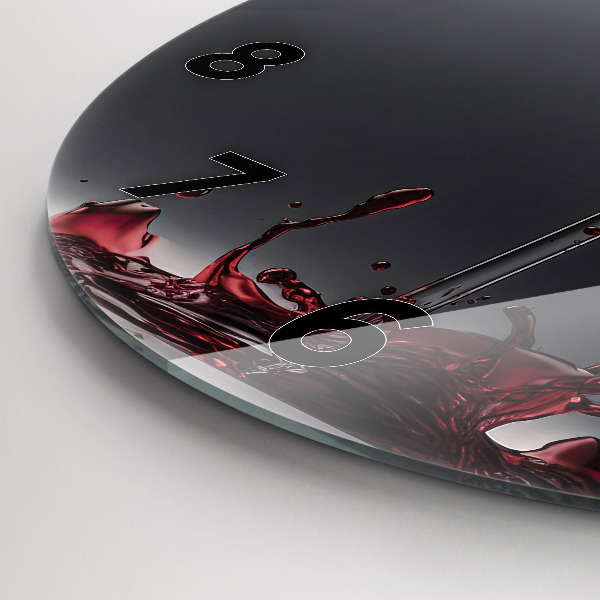 Round glass clock A glass of red wine