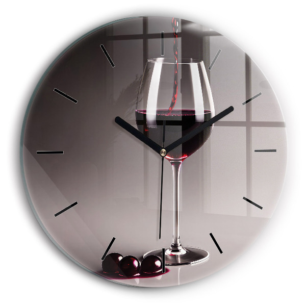 Round glass clock A glass of red wine