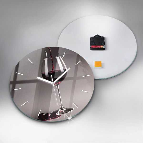 Round glass clock A glass of red wine
