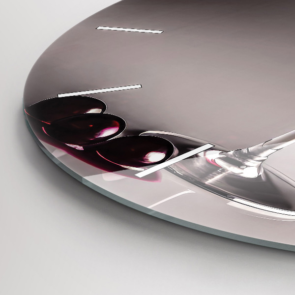 Round glass clock A glass of red wine
