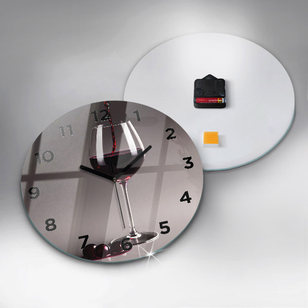 Round glass clock A glass of red wine