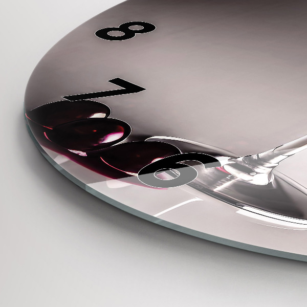 Round glass clock A glass of red wine