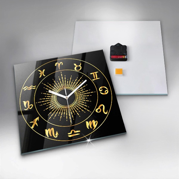 Square glass clock Golden zodiac signs on black background
