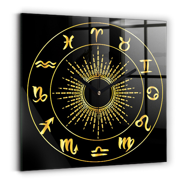 Square glass clock Golden zodiac signs on black background